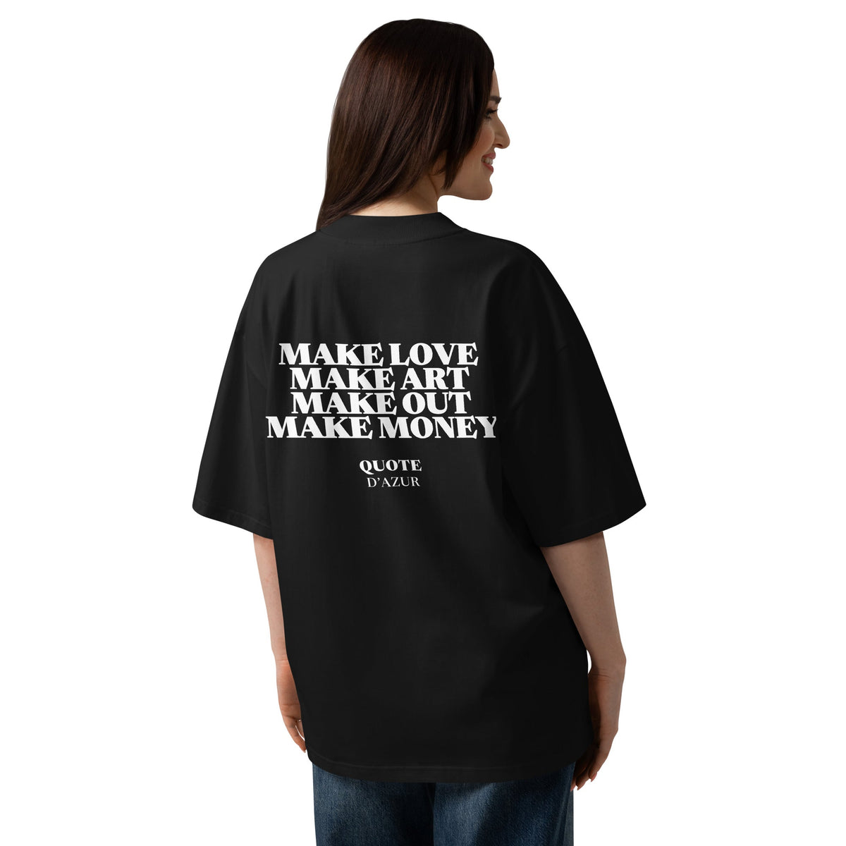 Make Love, Make Art, Make Out, Make Money – Oversized T-Shirt in Black, back view on a female model.