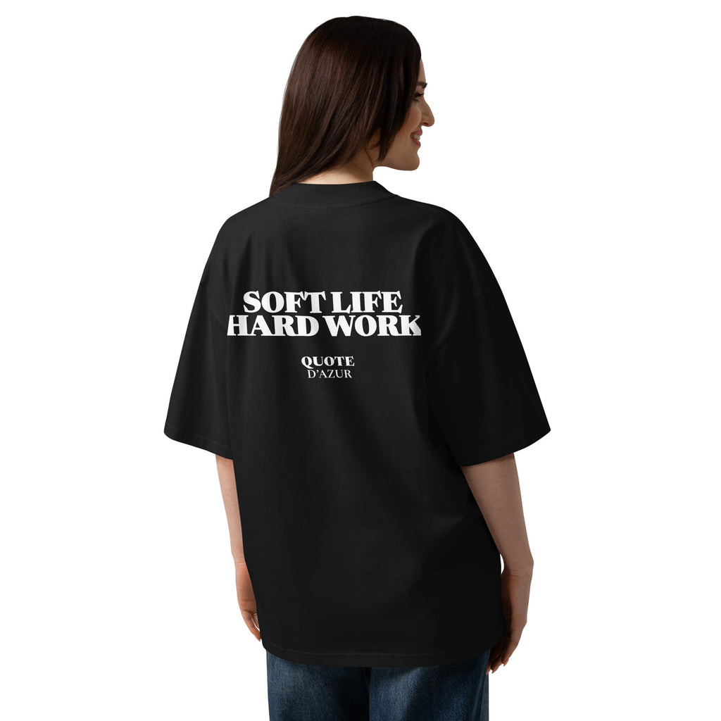 Soft Life, Hard Work – Oversized T-Shirt in Black, back view on a female model.