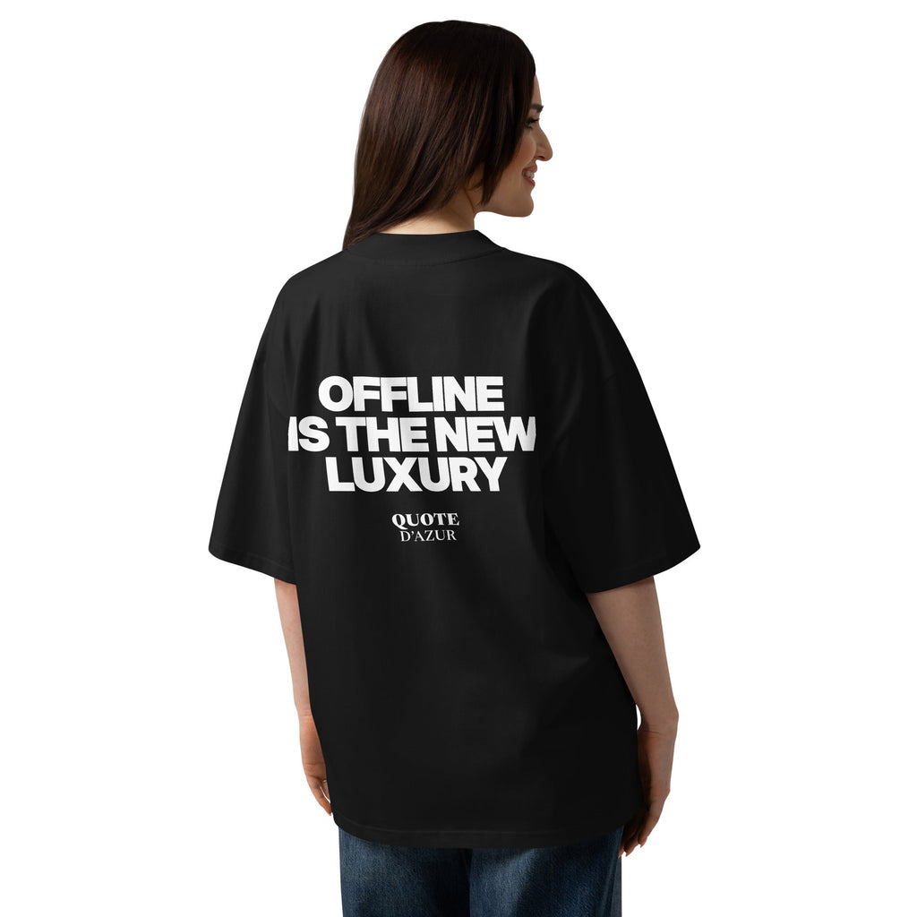 Offline Is the New Luxury – Oversized T-Shirt in Black, back view on a female model.