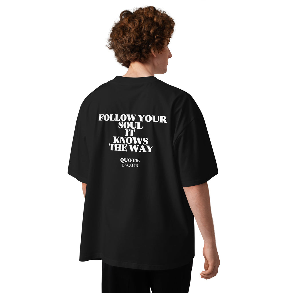 Follow Your Soul It Knows the Way – Oversized T-Shirt in Black, back view on a male model.