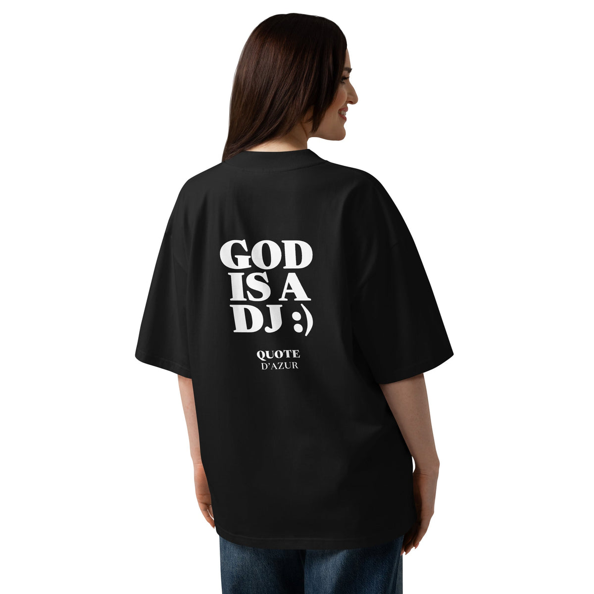God Is a DJ :) – Oversized T-Shirt in Black, back view on a female model.