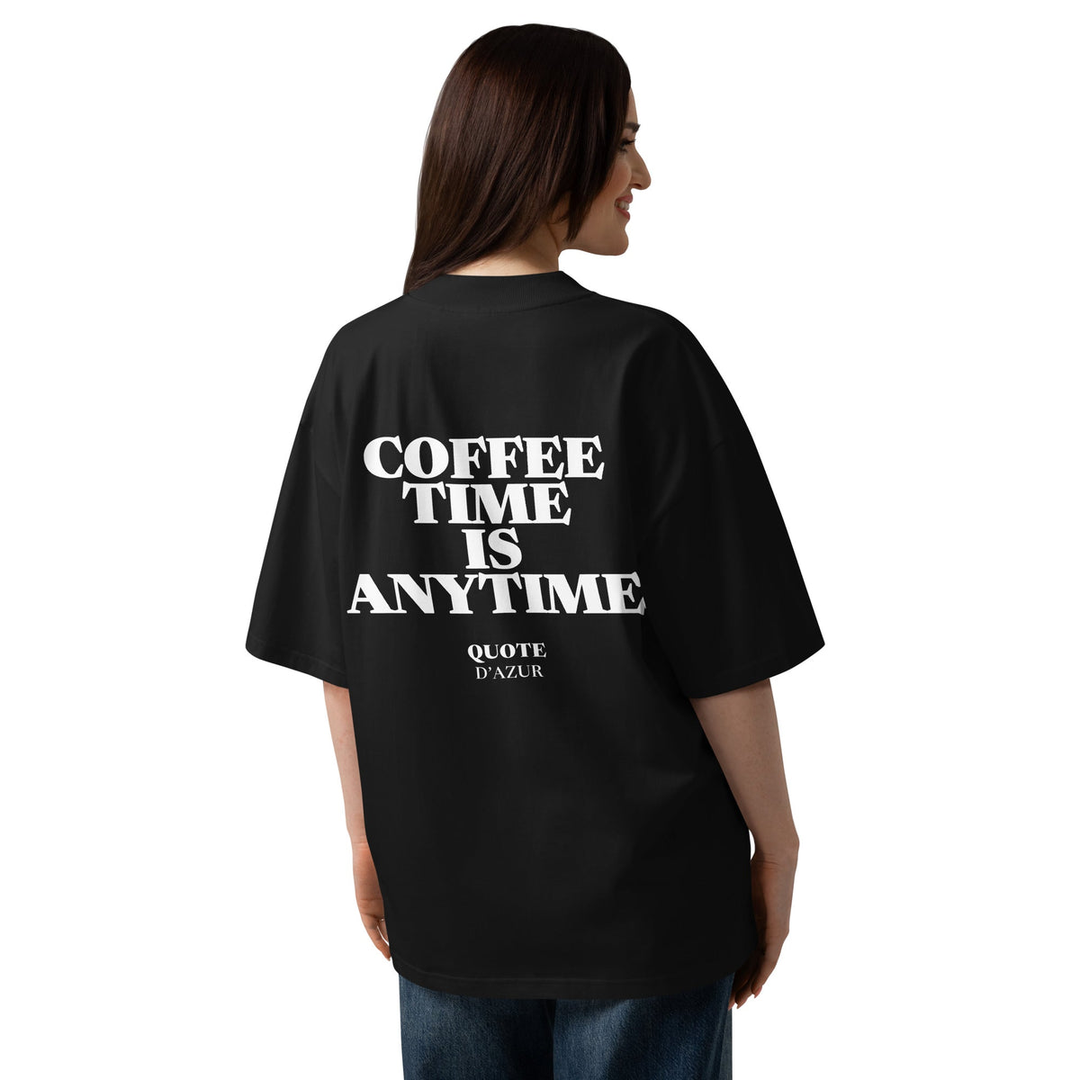 Coffee Time Is Anytime – Oversized T-Shirt in Black, back view on a female model.